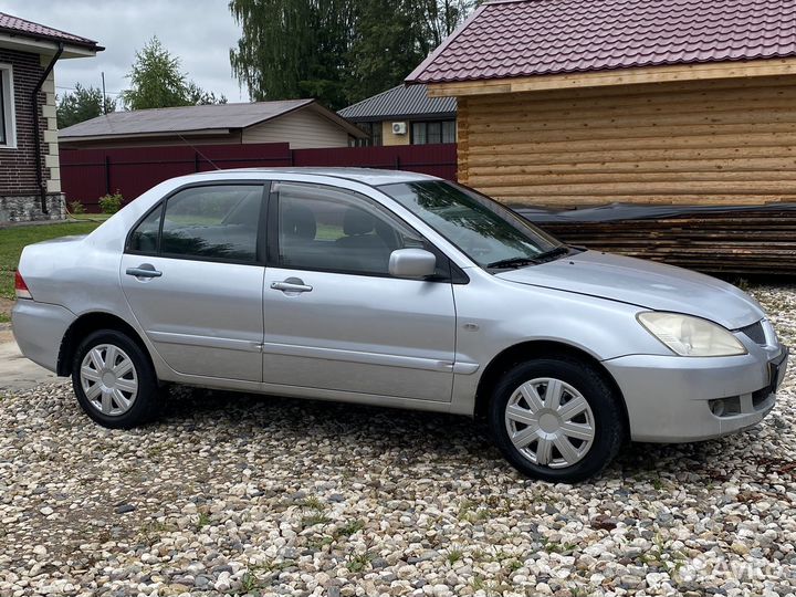 Mitsubishi Lancer 1.6 МТ, 2005, 331 000 км