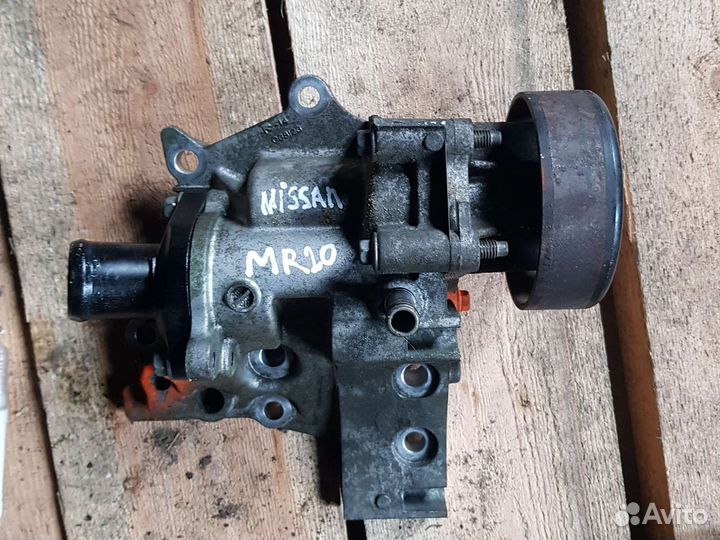 Помпа в сборе с корпусом Nissan mr20de