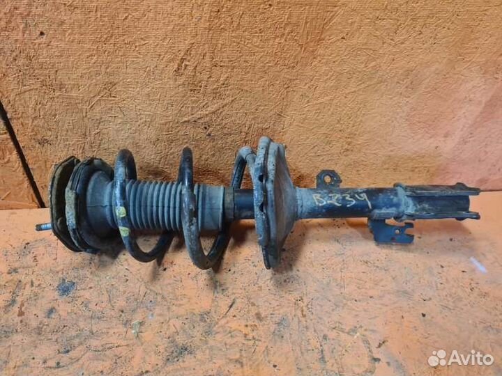 Стойка амортизатора передняя левая Toyota