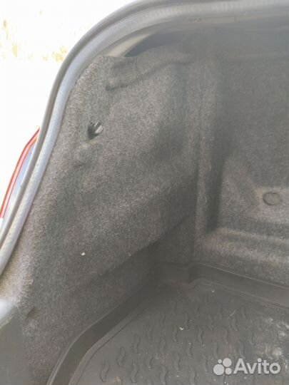 Обшивка багажника Mitsubishi Lancer 9