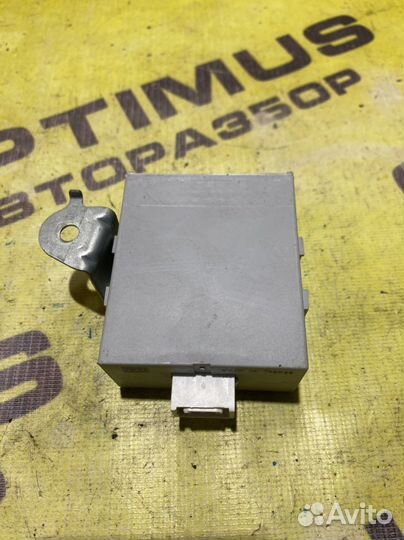 Блок управления центрального замка Toyota Corolla