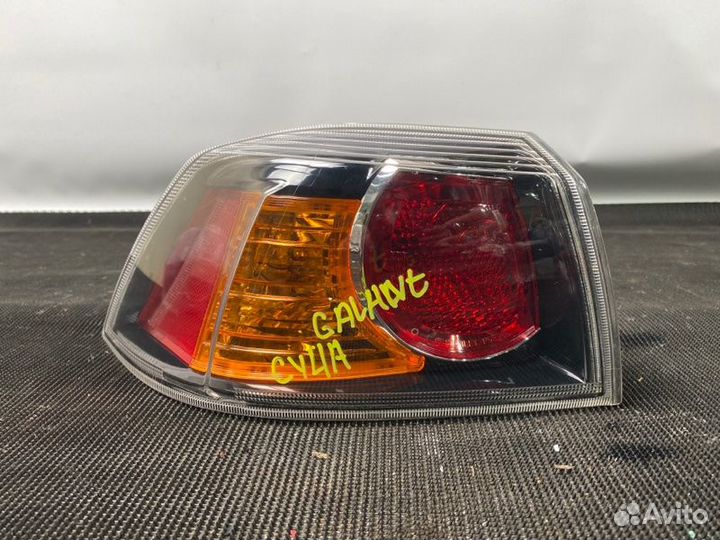 Левый фонарь Mitsubishi Lancer X