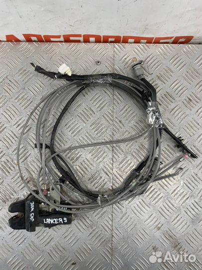 Трос открывания багажника Митсубиши Лансер 9
