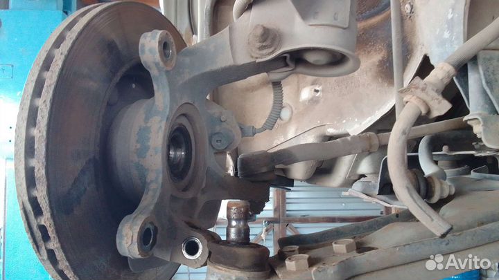 Кулак поворотный правый Шевроле Лачетти