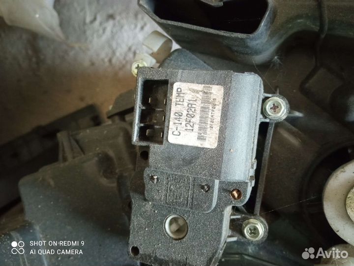 Моторчик заслонки печки Опель Антара