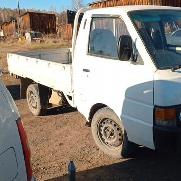 Бортовой Nissan Vanette, 1990