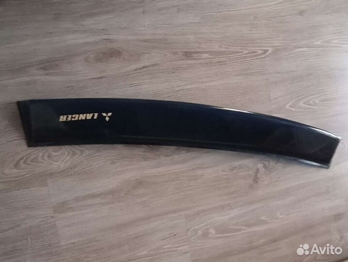 Дефлектор (козырек) заднего стекла lancer 9