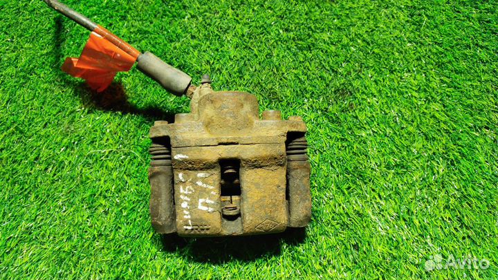 Суппорт тормозной передний левый Renault Symbol 2