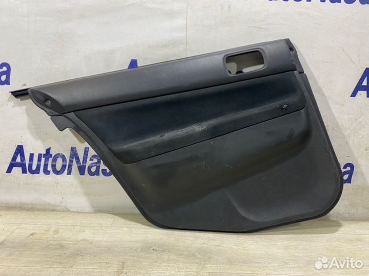 Обшивка двери задняя левая Mitsubishi Lancer седан