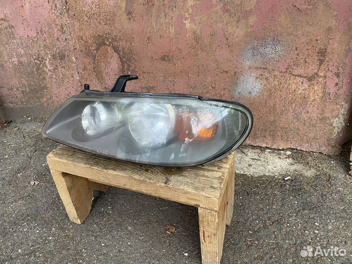 Левая фара Nissan Almera N16