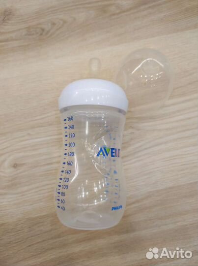 Молокоотсос medela ручной, бутылочка Philips Avent