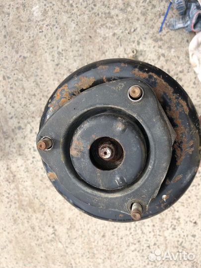 Амортизатор пружина передний левый Nissan Primera