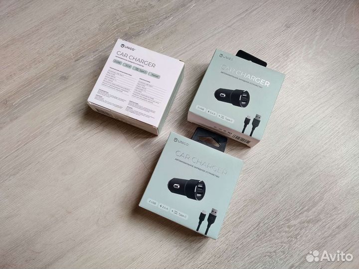 Автомобильный зарядник Unico 2.4A (новый)