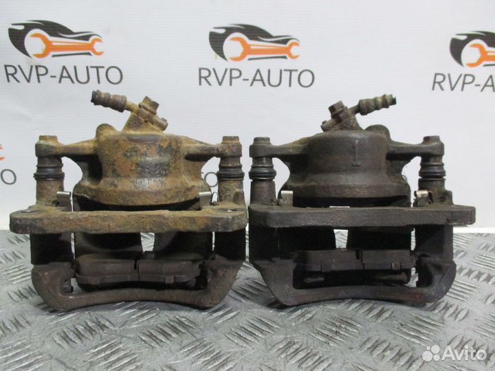 Суппорт тормозной передний Toyota Camry 1992-1996