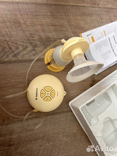 Молокоотсос medela swing электрический