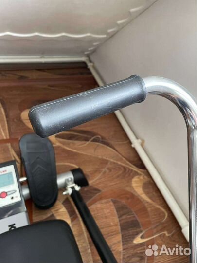 Гребной тренажер