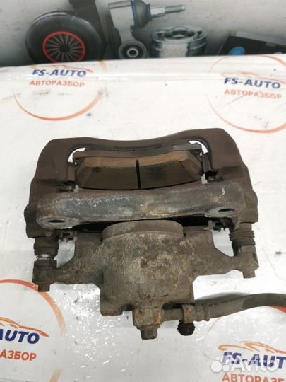 Суппорт тормозной передний левый Opel Astra J