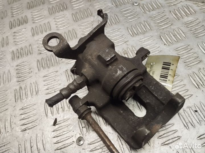 Суппорт задний правый Ford Focus 1