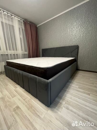 Кровать с подъемным механизмом