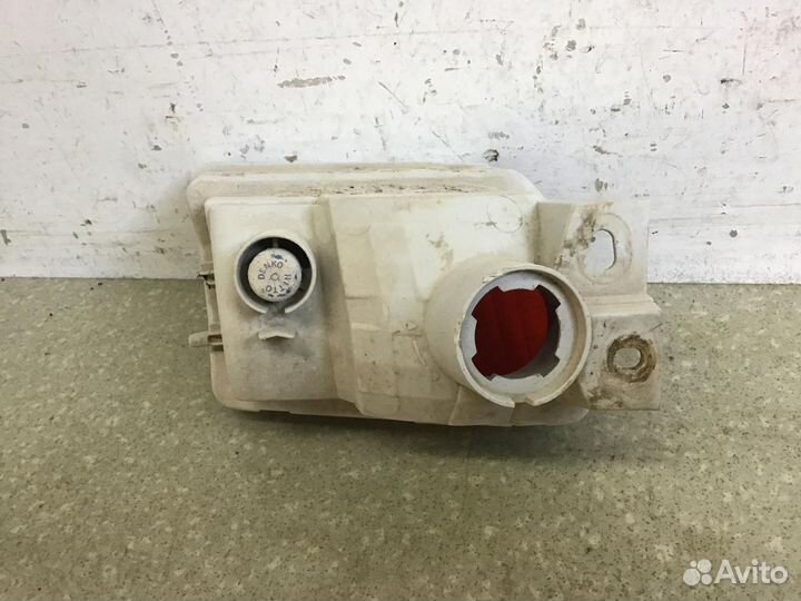 Фонарь задний в бампер левый Toyota Land Cruiser