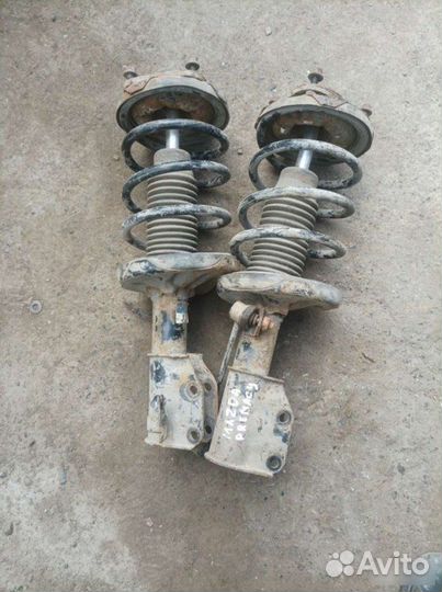 Стойка передняя Mazda Premacy