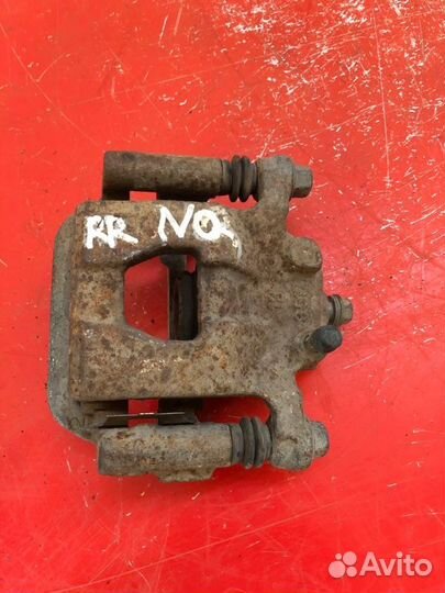 Суппорт тормозной задний правый Nissan Qashqai J10