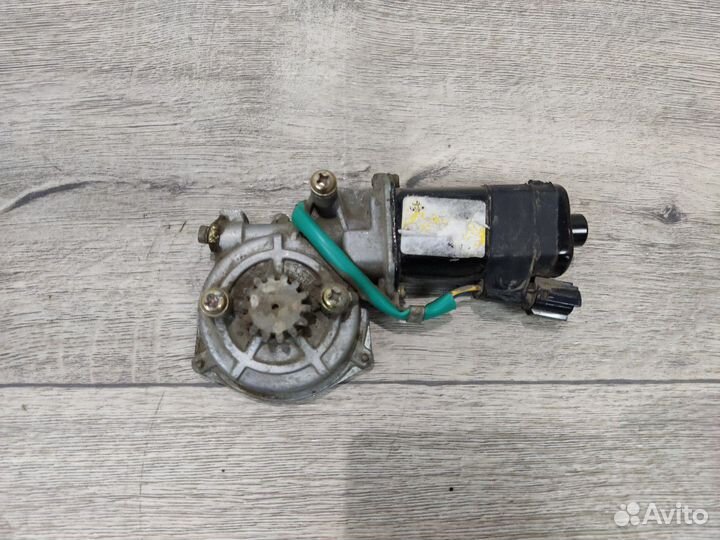 Моторчик стеклоподъемника задний правый Nexia