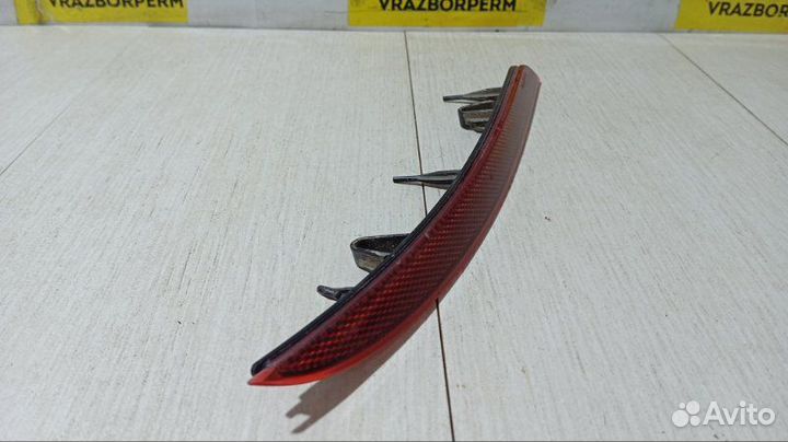Отражатель в бампер задний правый Opel Astra J