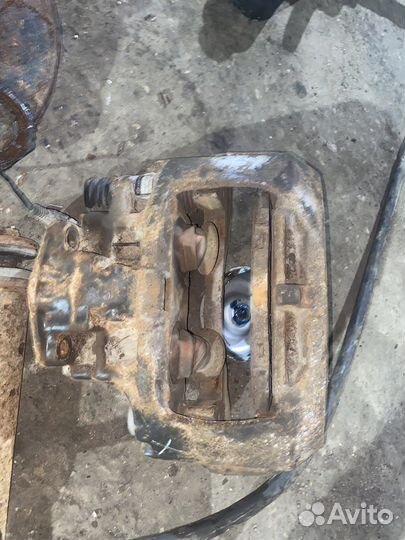 Суппорт тормозной передний Scania R 4 серии