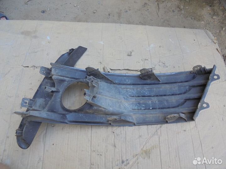 Накладка птф левая передняя Toyota Corolla 180