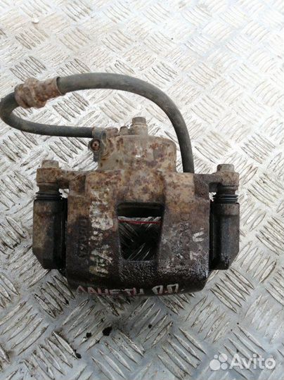 Суппорт передний правый Chevrolet Lacetti J200 1.6