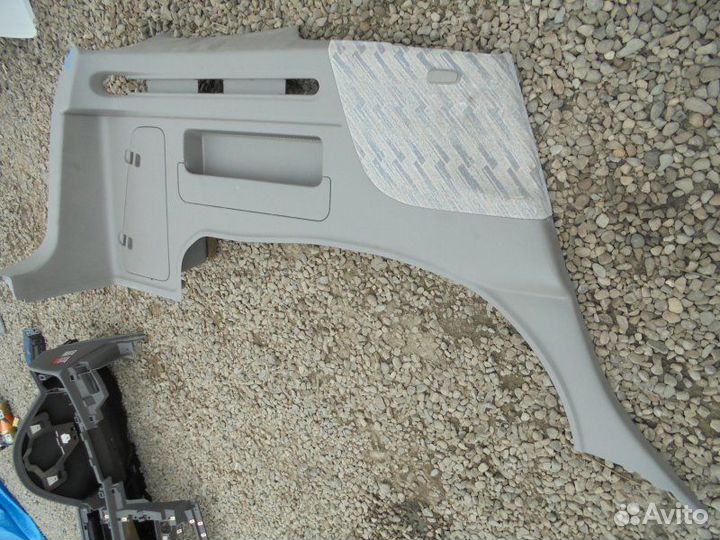 Обшивка багажника левая Nissan R'nessa N30 SR20DE