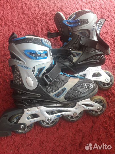 Роликовые коньки