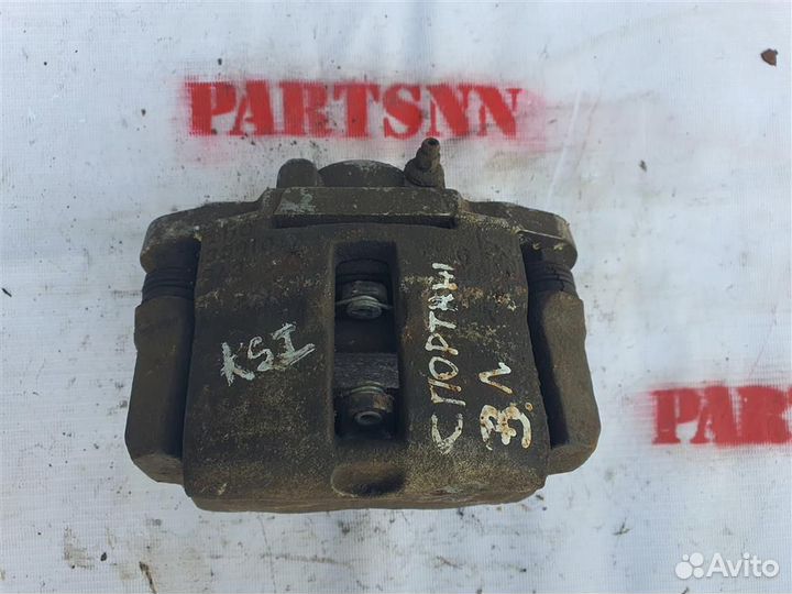 Суппорт задний левый Киа Спортаж