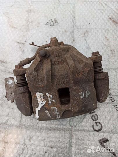 Суппорт тормозной передний правый kia soul 1