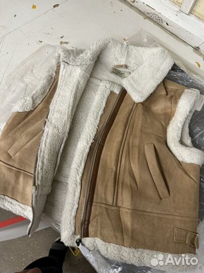 Жилетка женская