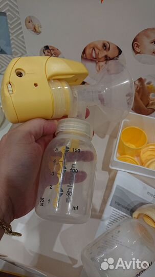 Молокоотсос medela электрический и бутылка Calma