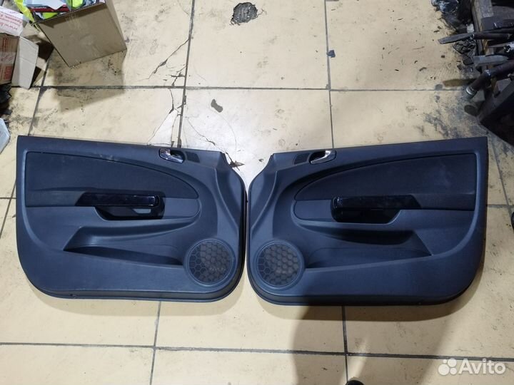 Обшивка двери правая левая Opel Corsa D