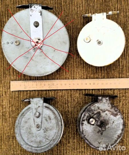 Катушка рыболовная инерционная