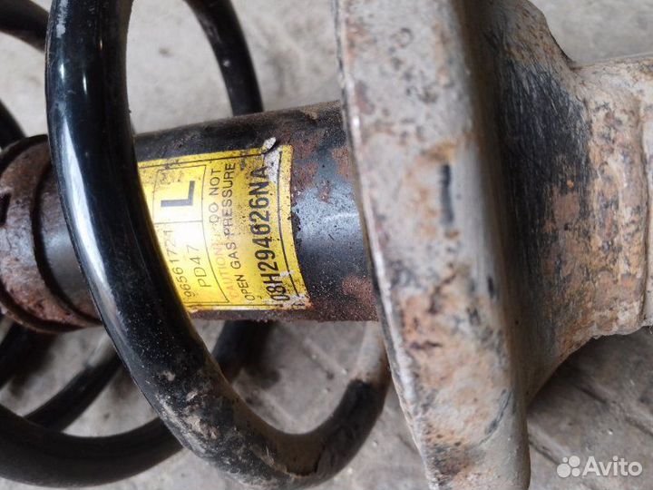 Амортизатор передний левый Chevrolet Lacetti седан