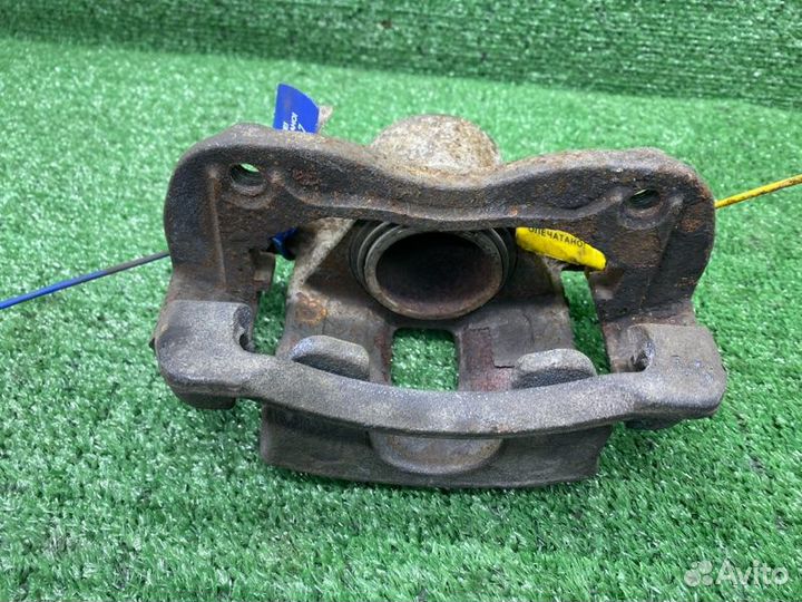 Тормозной суппорт передний левый Kia Rio 3