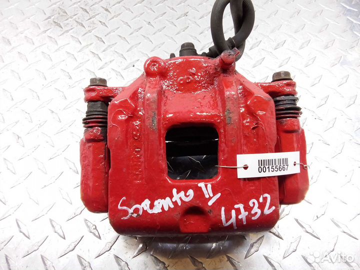 Суппорт передний правый Kia Sorento 2 XM