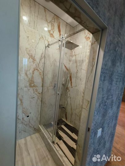 Стеклянные душевые перегородки