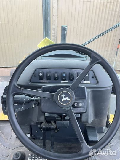 Экскаватор-погрузчик John Deere 325J, 2012
