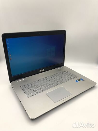 Большой, мощный, металлический ноутбук