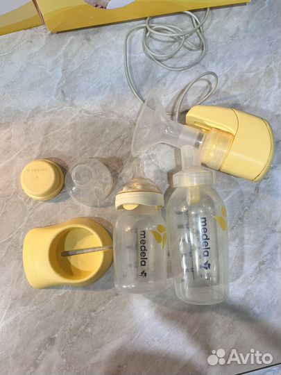 Молокоотсос medela электрический