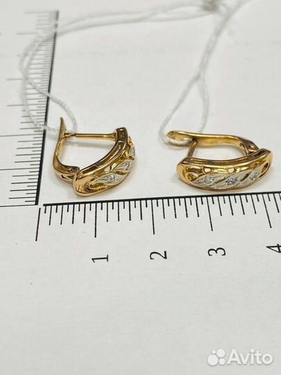 Золотые серьги с камнем