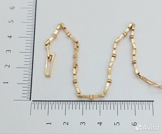 Золотой браслет с камнем