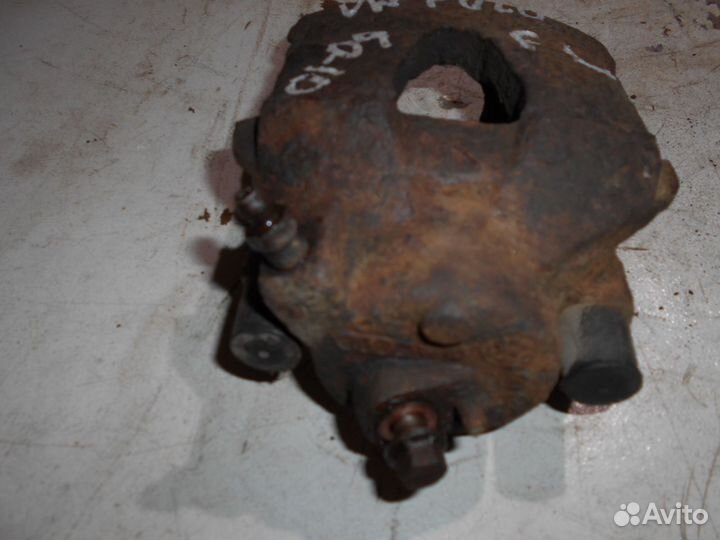 Суппорт передний левый VW Polo