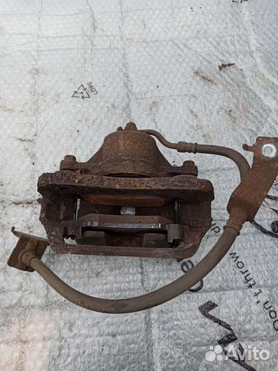 Суппорт тормозной передний правый kia soul 1